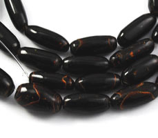 Vintage black coral oval beads